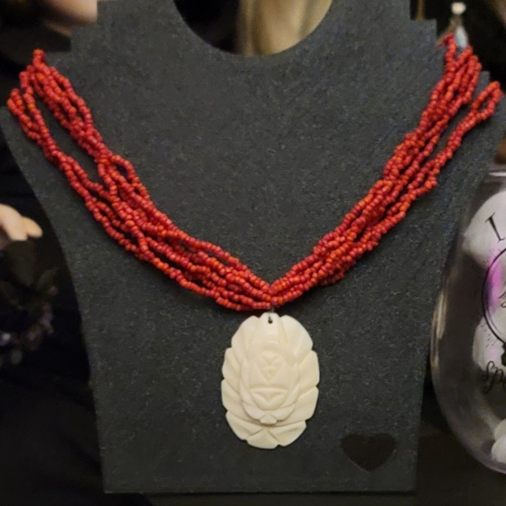 Red Multistrand Coral Necklace with Ivory Pendant